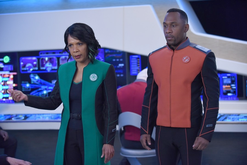 Claire and Orville engineering chief John LaMarr (J. Lee) on the bridge.